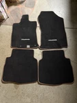 Subaru Floor Mats Carpeted Touring Brown Part Number J501SSG310. Fixed Price $70.00.