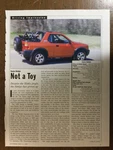 Aw 734 Article Driving Impression 1998 Isuzu Amigo Not Toy. Fixed Price $14.99.