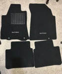 2017 Nissan Altima Black Floor Mats Carpet - Front And Rear 4 Pieces. Fixed Price $100.00.