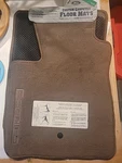 Ford 97-2002 Custom Carpeted Floor Mats Set Of Prairie Tan # F75Z-1513086-RA. Fixed Price $100.00.