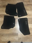 Mopar Floor Mats Set Of Four Black Jeep Logo Model 6LJ74TX7AB Like New. Fixed Price $59.99.